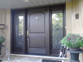 Mastergrain Fiberglass Custom door Miliano Sienna wrought iron sidelites